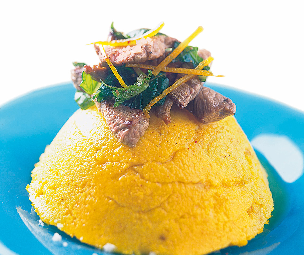 Polenta au jus d'orange et sauté d'agneau minute